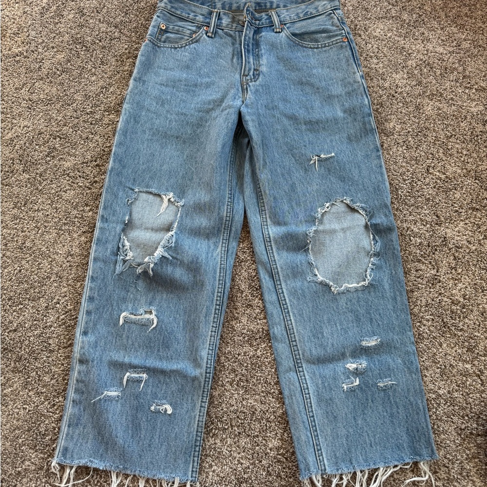 Distressed Levi Blue Jeans